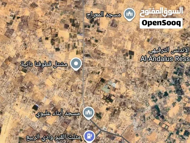 صورة 1 لـ أرض تجارية 9200 متر بعد مثلث القيو على الرئيسي — عين زارة — طرابلس